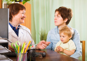 mother and baby with doctor